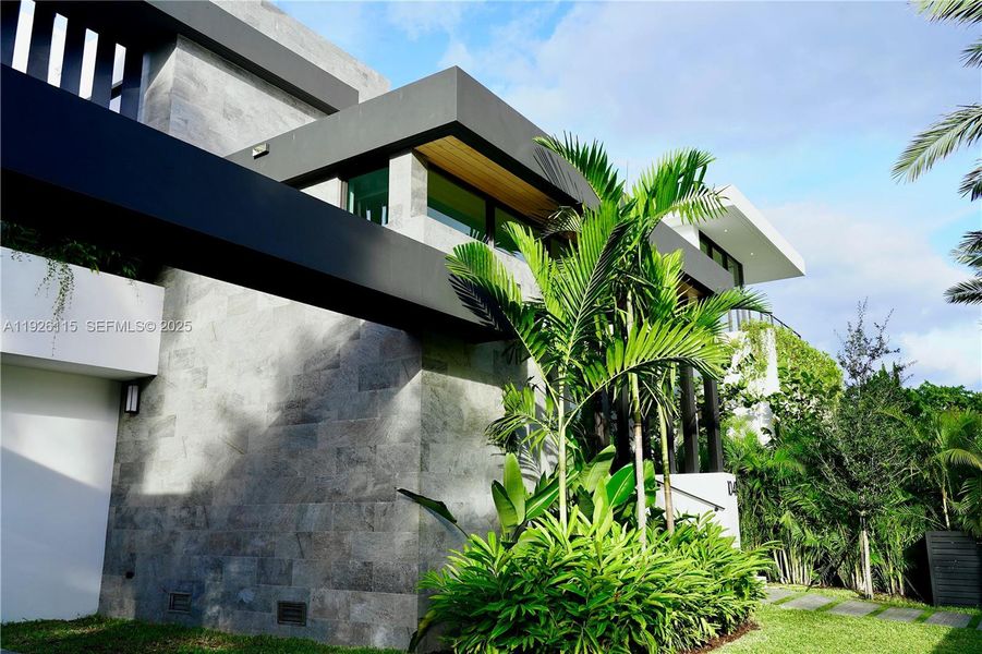 Exterior details and patio area of a home in , Miami (Image 1). Exterior details and patio area of a home in , Miami (Image 1).