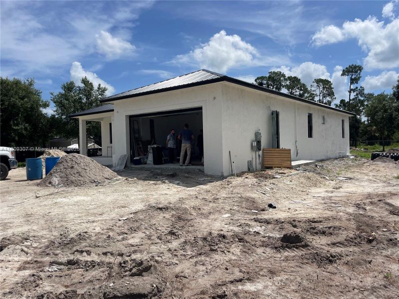 Front exterior of a new home in , Clewiston, FL, highlighting curb appeal (Image 17). Front exterior of a new home in , Clewiston, FL, highlighting curb appeal (Image 17).