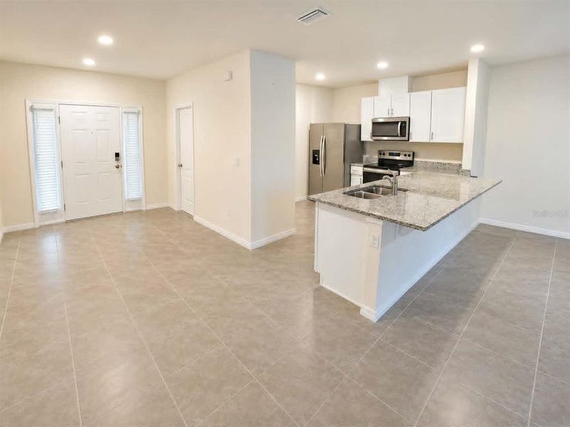 Furnished interior view inside a new home in Rivers Edge, Edgewater (Image 11).