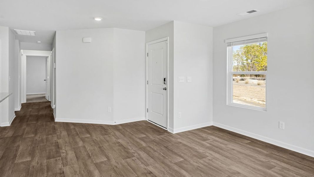 Representative unfurnished interior of a home built from the BAYSHORE by D.R. Horton in Indigo Preserve Townhomes, Leland (Image 14).