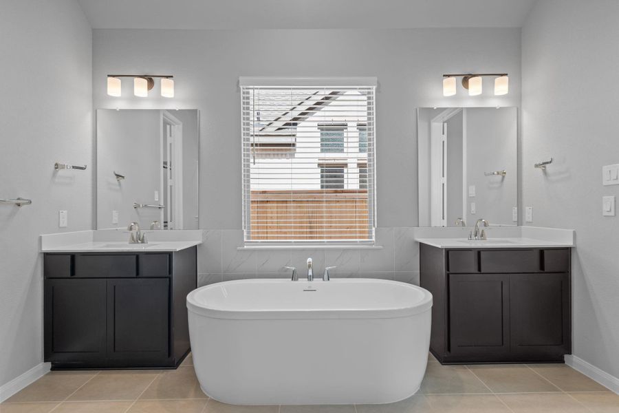 Furnished interior view inside a new home in Bridgeland 55', Cypress (Image 10).