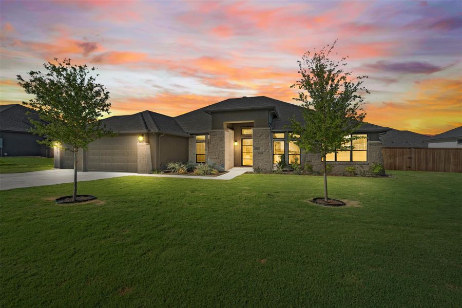 Front exterior of a new home in , Nolanville, TX, highlighting curb appeal (Image 23).