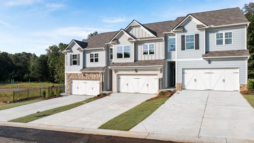Front exterior of a new home in Waypoint, Flowery Branch, GA, highlighting curb appeal (Image 2).