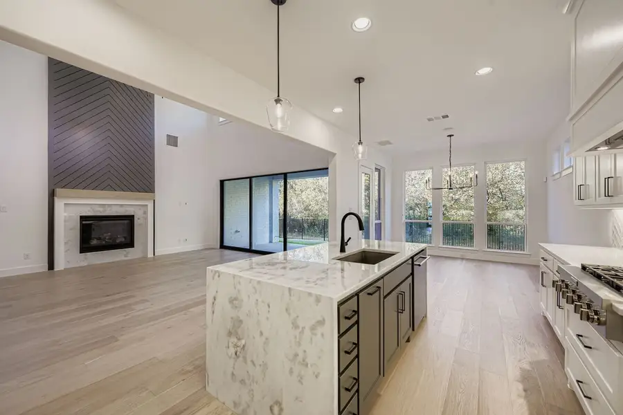 Plan 1643 living room/dining room/kitchen representative photo