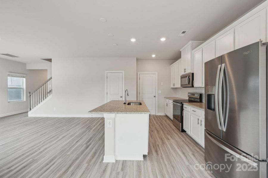 Furnished interior view inside a new home in Walnut Reserve, Conover (Image 3).