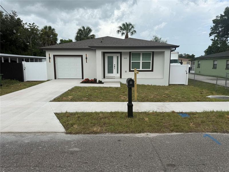 Front exterior of a new home in , Tampa, FL, highlighting curb appeal (Image 23).