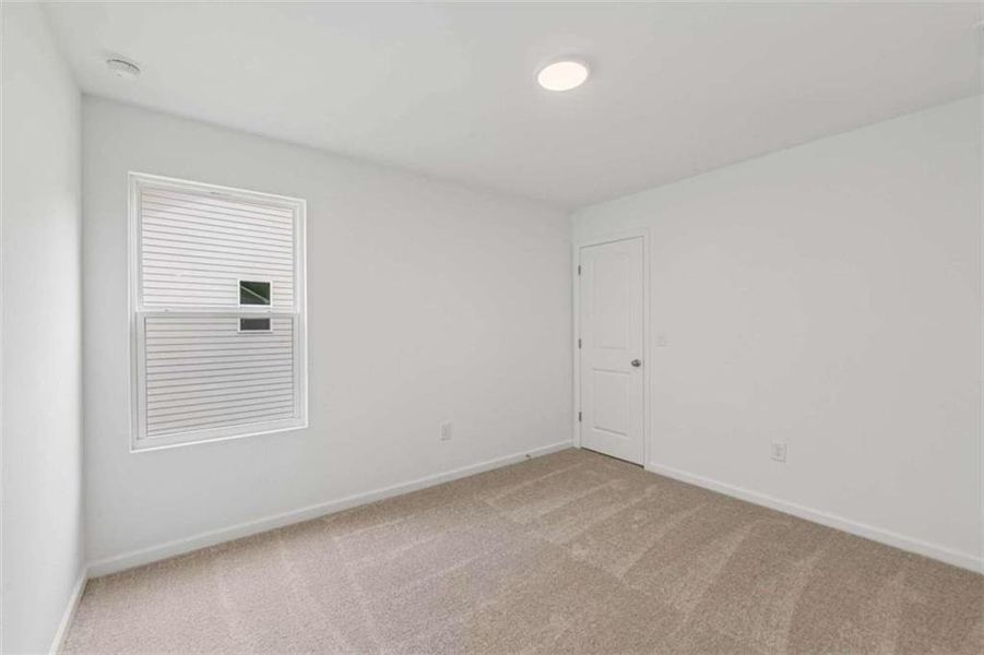 Spacious, unfurnished interior of a new home in The Pointe at Heron Bay, Locust Grove (Image 22).