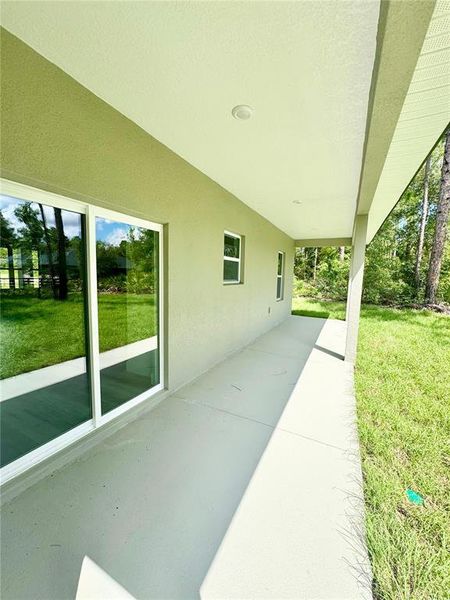 Exterior details and patio area of a home in , Citrus Springs (Image 22).
