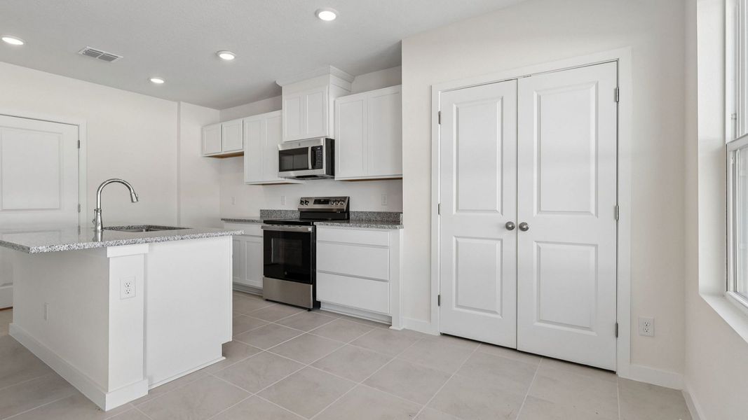 Furnished interior view inside a new home in Cyrene at Harmony, St. Cloud (Image 10). Furnished interior view inside a new home in Cyrene at Harmony, St. Cloud (Image 10).