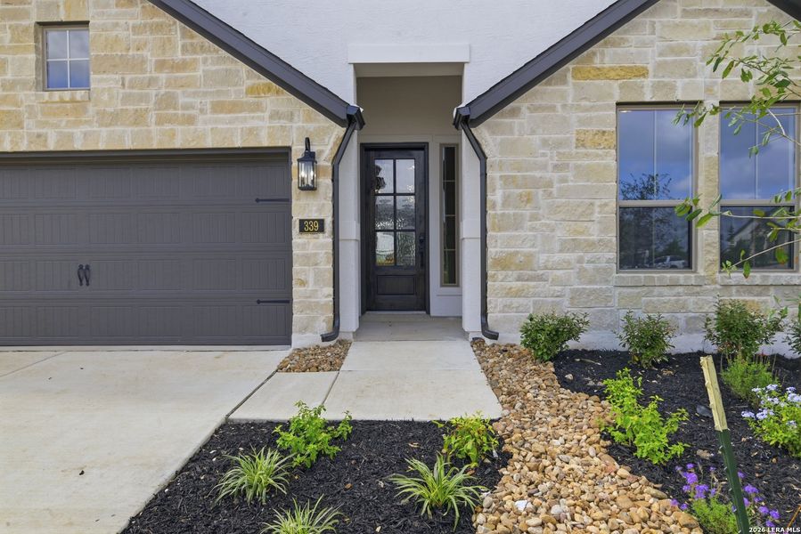 Exterior details and patio area of a home in Legacy at Lake Dunlap, New Braunfels (Image 18).