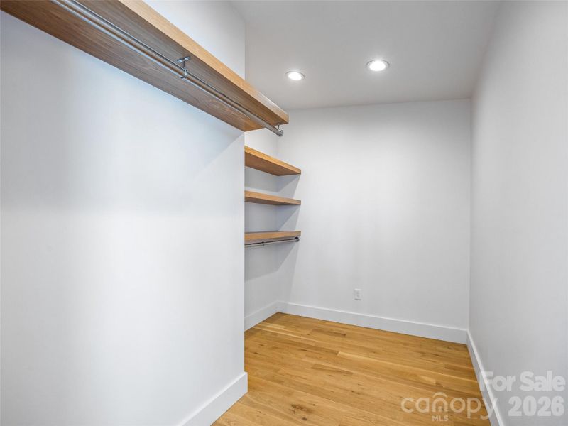 Plenty of space in the primary suite's walk in closet. Plenty of space in the primary suite's walk in closet.