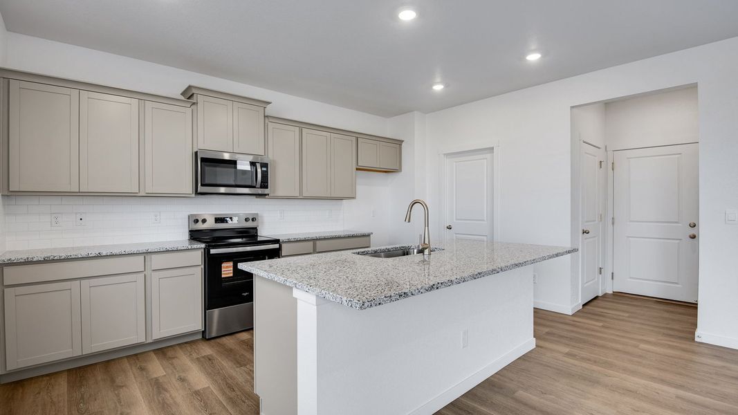 Furnished interior view inside a new home in Silver Peaks, Lochbuie (Image 8).