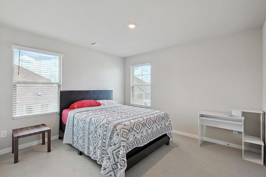 Bedroom featuring carpet flooring