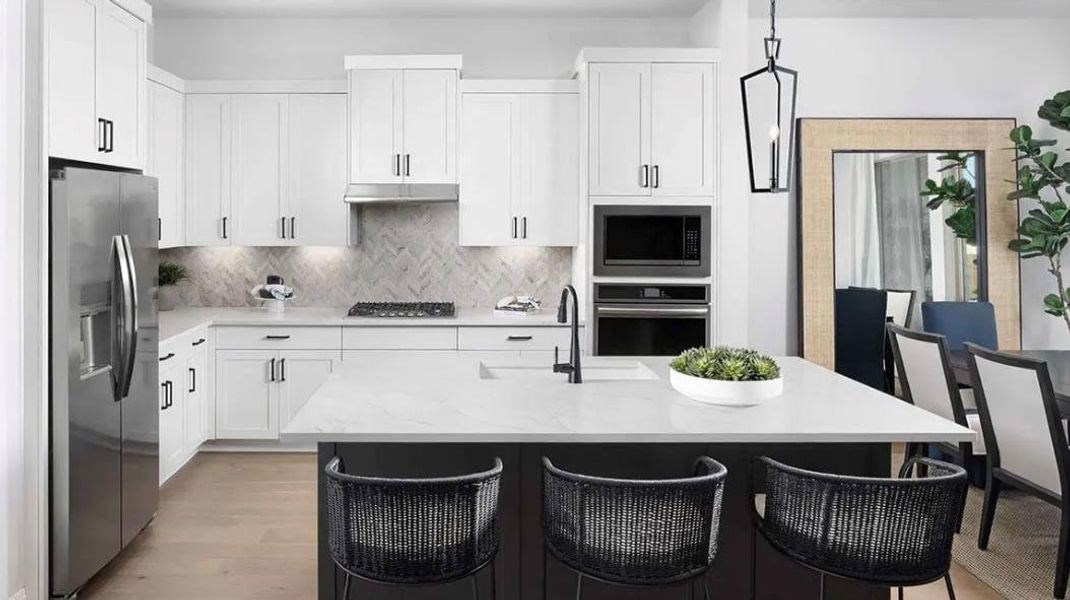Furnished interior view inside a new home in 6 Creeks, Kyle (Image 3).