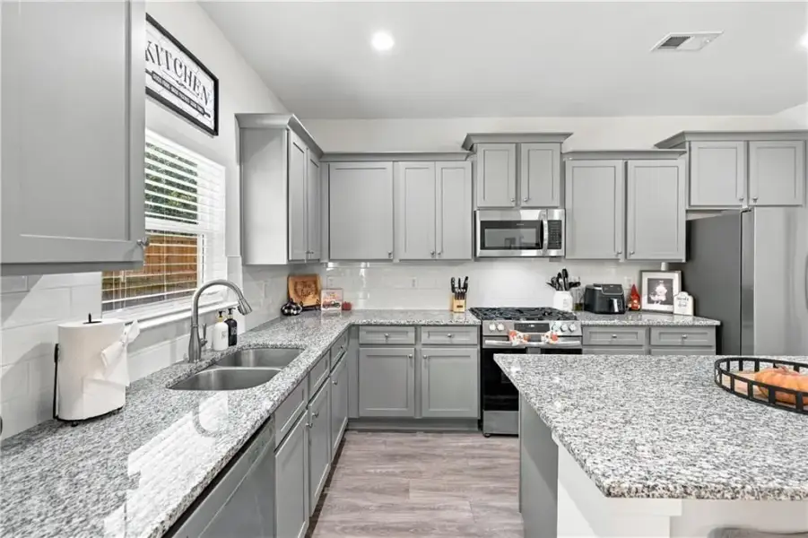 Furnished interior view inside a new home in Sutton’s Landing, Statham (Image 13).