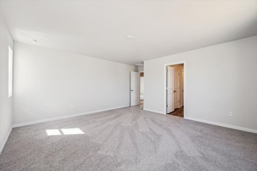 A hallway with white walls. A hallway with white walls.