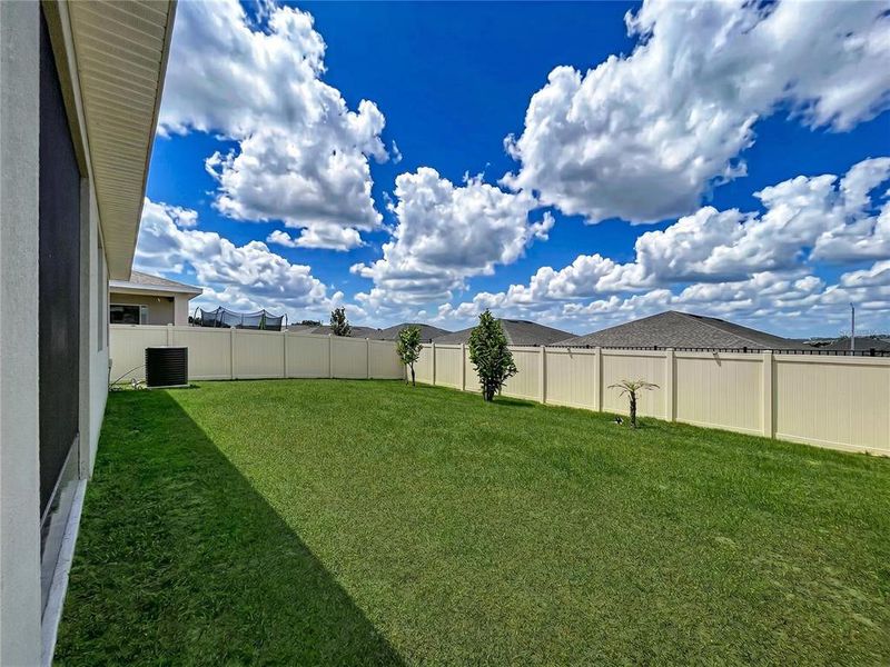 Exterior details and patio area of a home in Seasons at Mabel Place, Lake Wales (Image 4).