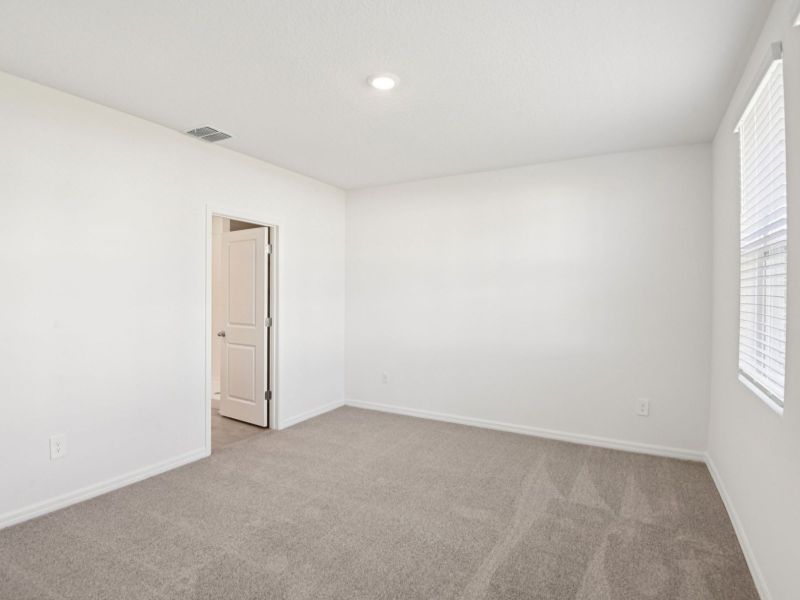 Spacious, unfurnished interior of a new home in Salt Meadows - Premier Series, Parrish (Image 11).