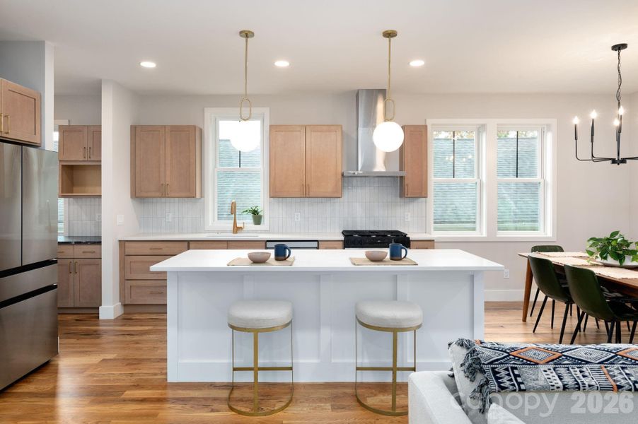 Modern Kitchen Features Quartz and Stainless Steel