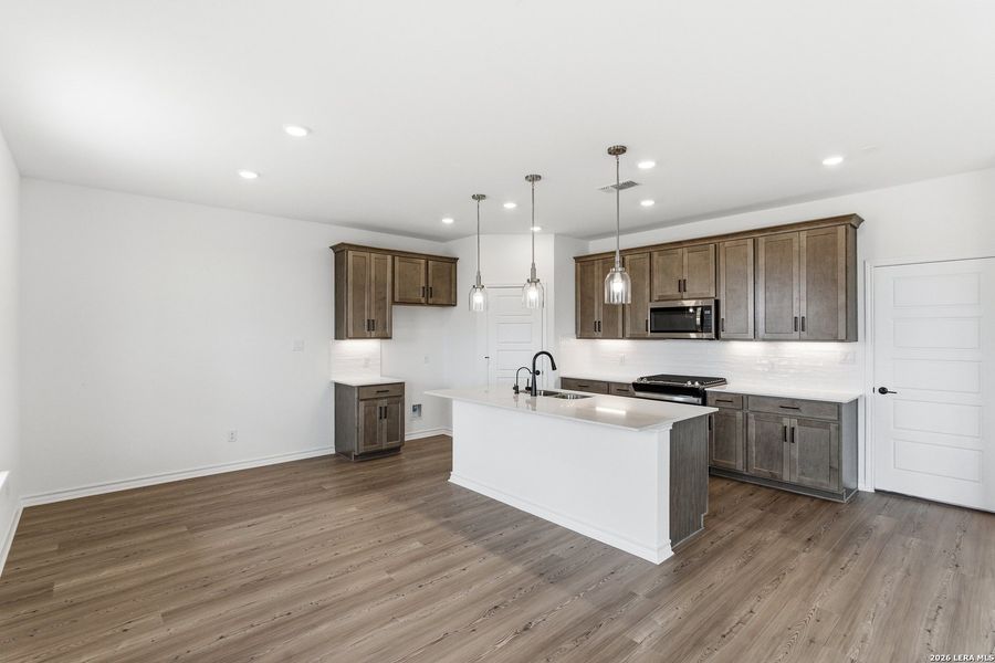 Furnished interior view inside a new home in Nopal Valley, San Antonio (Image 13).