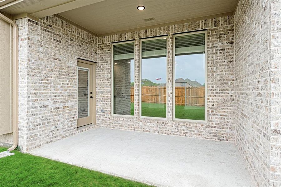 Exterior details and patio area of a home in East Oak Creek 50-55, Commerce (Image 22). Exterior details and patio area of a home in East Oak Creek 50-55, Commerce (Image 22).