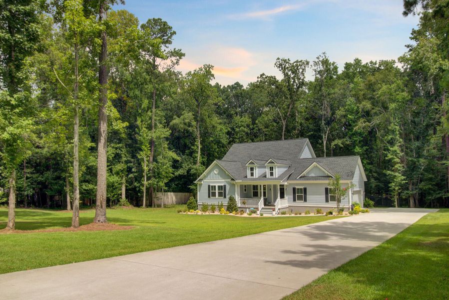 Front exterior of a new home in , Ridgeville, SC, highlighting curb appeal (Image 2). Front exterior of a new home in , Ridgeville, SC, highlighting curb appeal (Image 2).
