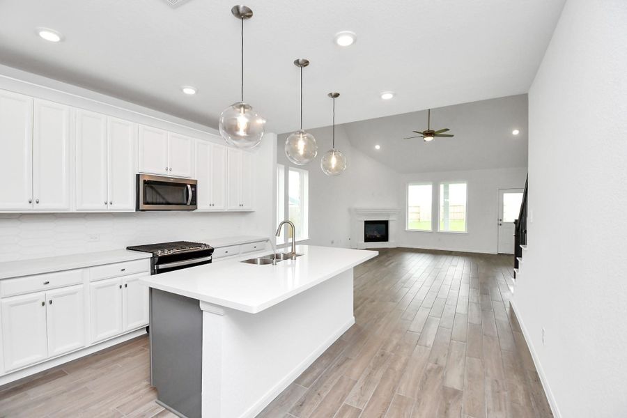 Furnished interior view inside a new home in Sunterra, Katy (Image 6).