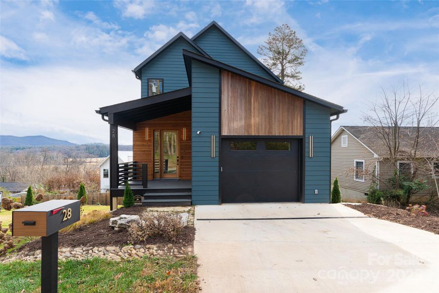 Stunning West Asheville home with mountain views overlooking the Biltmore Estate grounds Stunning West Asheville home with mountain views overlooking the Biltmore Estate grounds