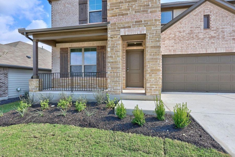 Exterior details and patio area of a home in Prairie Winds, Hutto (Image 22).