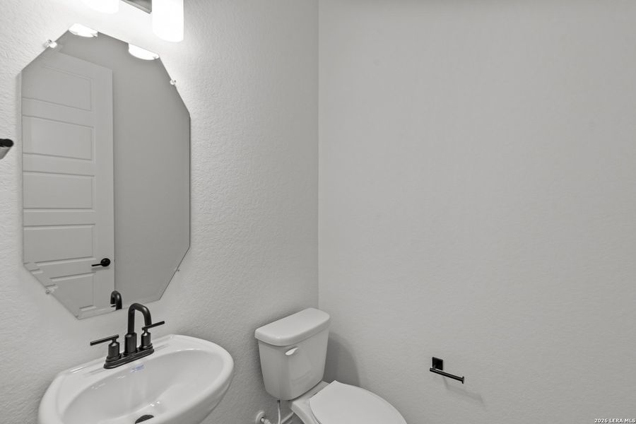 Furnished interior view inside a new home in Bison Ridge, San Antonio (Image 26).