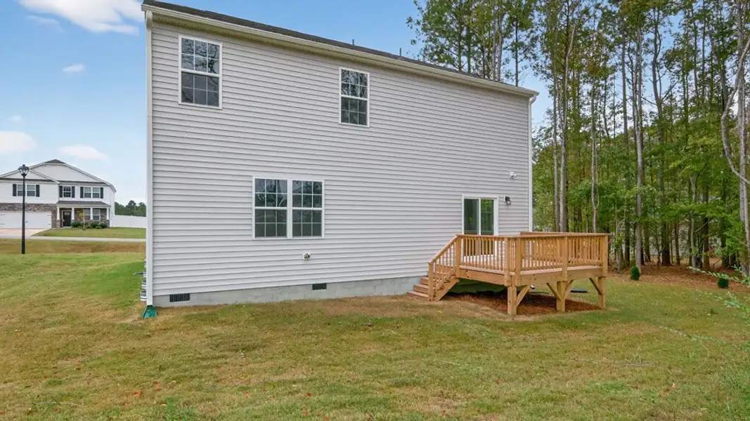 Exterior details and patio area of a home in Baker Farm, Youngsville (Image 4).