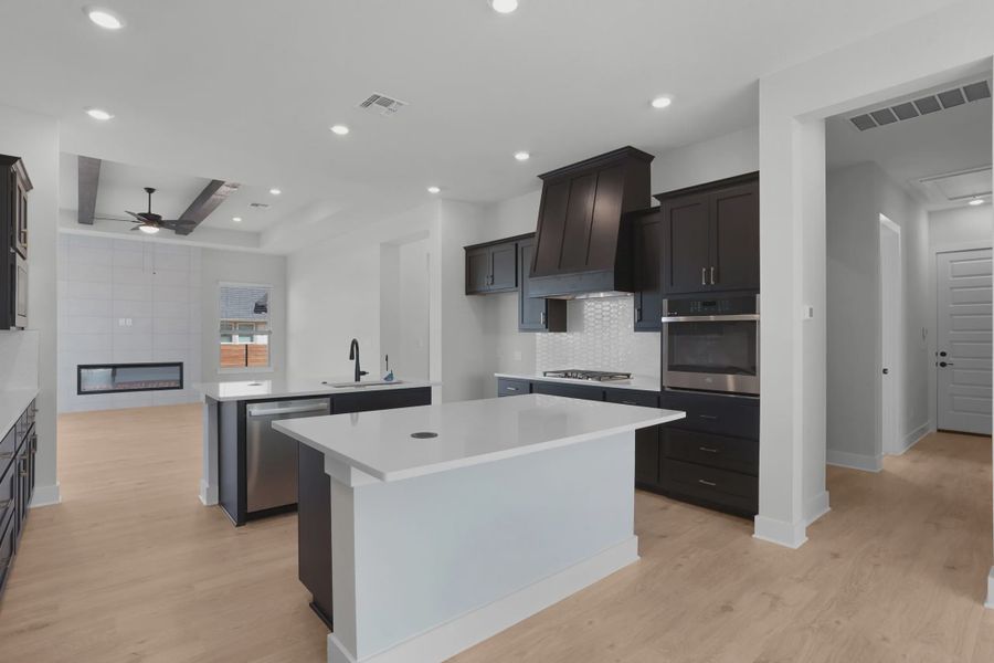 Representative furnished interior of a home built from the Sicily by Chesmar Homes in Berry Creek Highlands, Georgetown (Image 5).