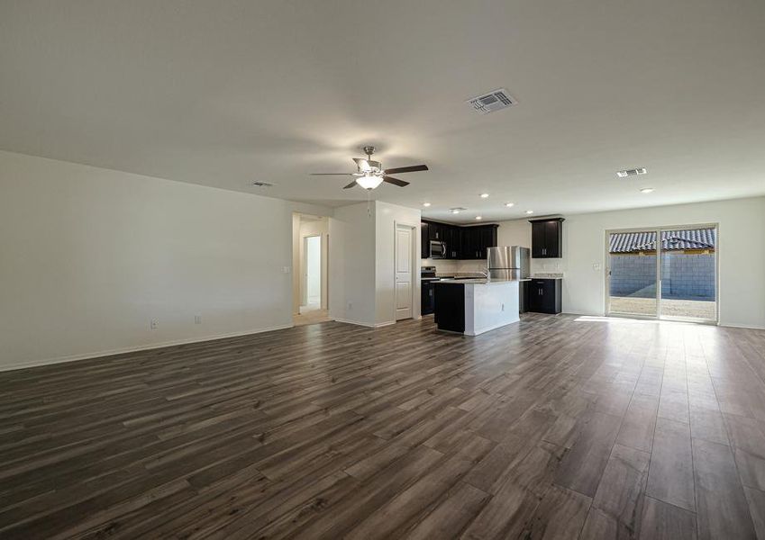 The living room opens up to the kitchen and dining area.