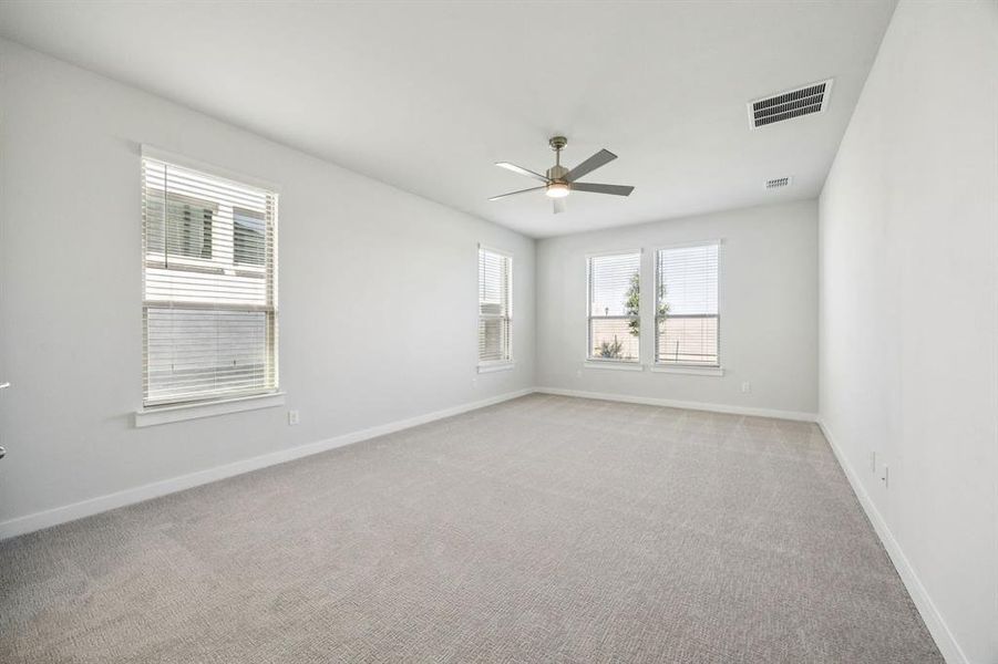 Primary Suite in the Wimbledon home plan by Trophy Signature Homes – REPRESENTATIVE PHOTO Primary Suite in the Wimbledon home plan by Trophy Signature Homes – REPRESENTATIVE PHOTO