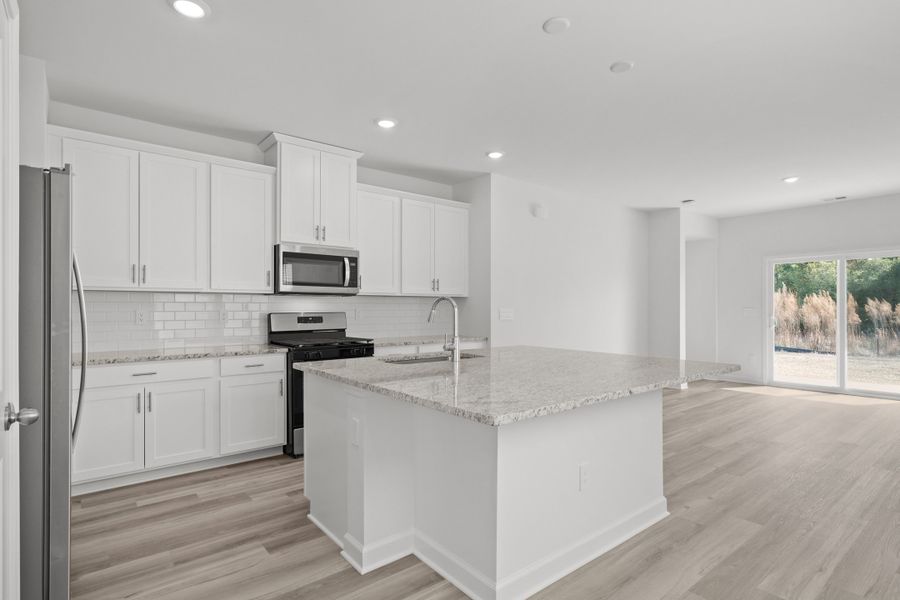 Furnished interior view inside a new home in Cypress Ridge - The Boardwalk Series, Longs (Image 5).