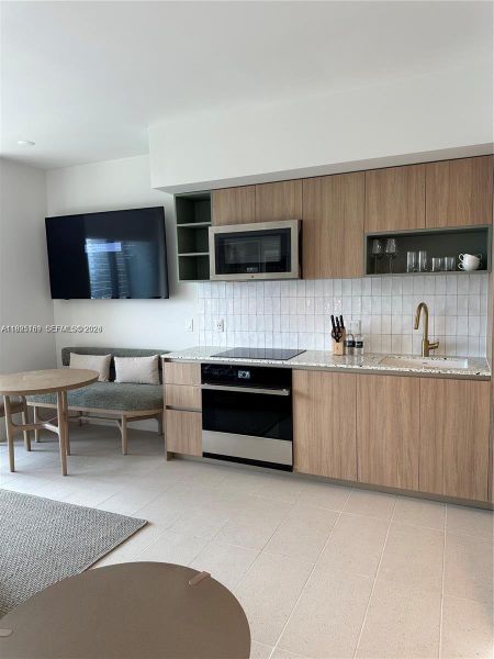 Furnished interior view inside a new home in , Miami (Image 10).