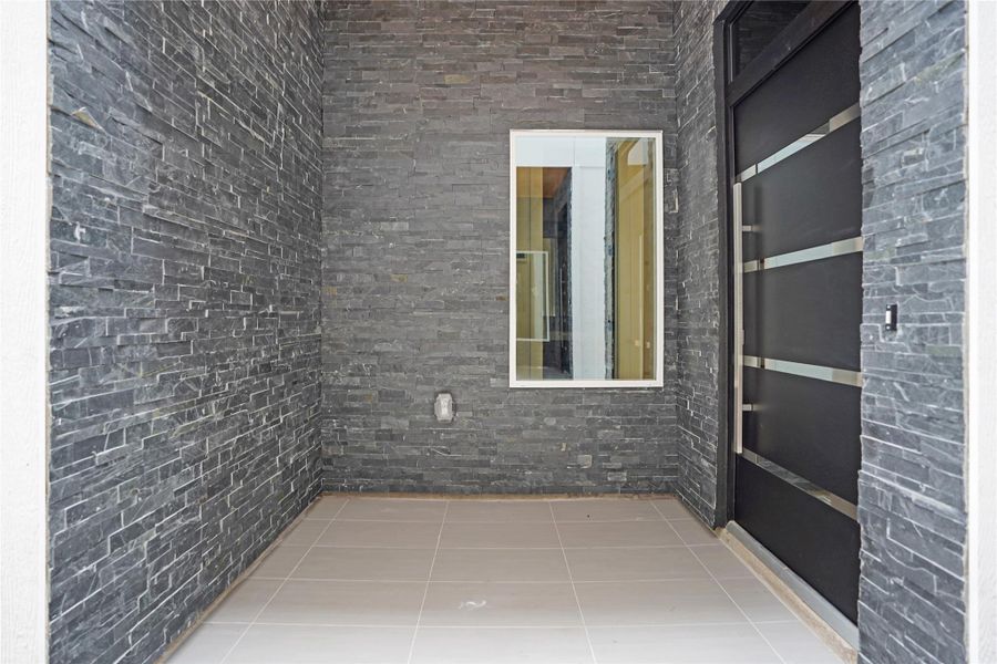 Exterior details and patio area of a home in , Houston (Image 4).