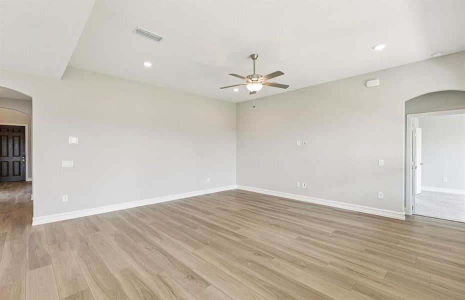 Expansive gathering room bathed in natural sunlight