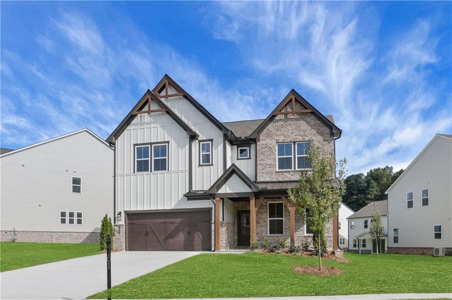 Front exterior of a new home in The Paddocks at Doc Hughes, Buford, GA, highlighting curb appeal (Image 29).