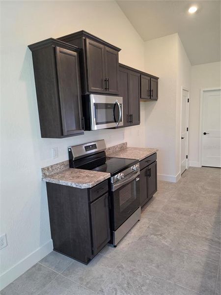 Furnished interior view inside a new home in Spring Hill, Spring Hill (Image 3).
