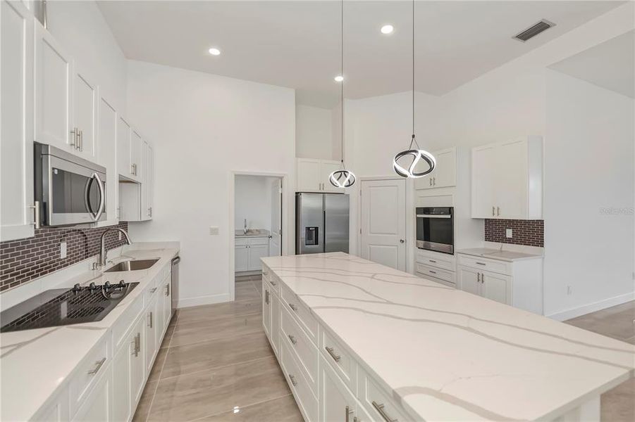 Furnished interior view inside a new home in , Port Charlotte (Image 9).