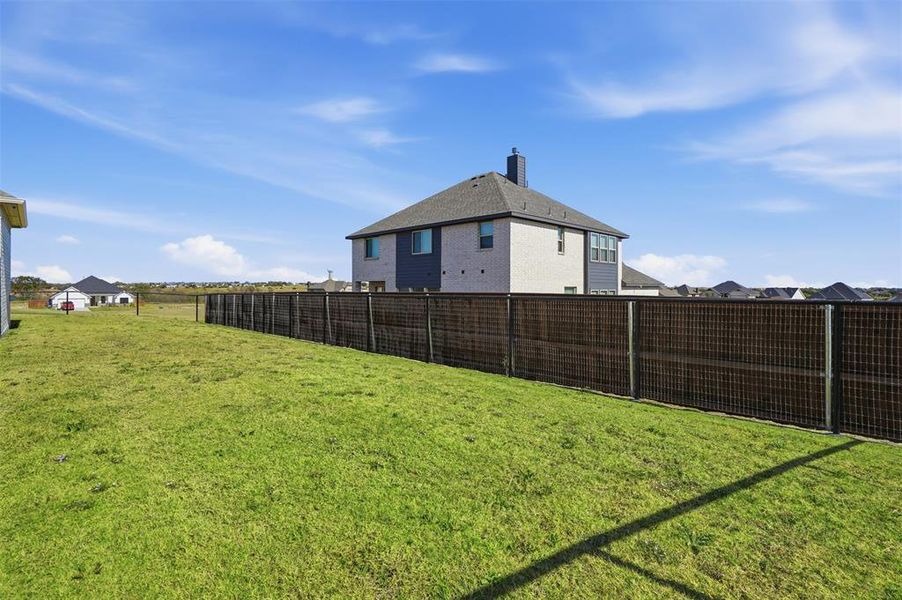 Exterior details and patio area of a home in Wildcat Ridge, Godley (Image 24). Exterior details and patio area of a home in Wildcat Ridge, Godley (Image 24).