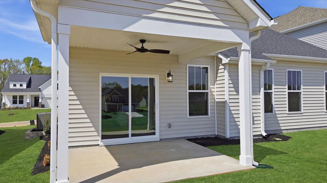 Exterior details and patio area of a home in Iris Meadows, Moore (Image 3).