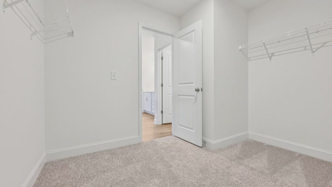 Furnished interior view inside a new home in Sidney Creek Single Family, Zebulon (Image 56).
