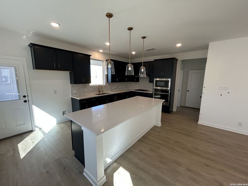 Furnished interior view inside a new home in Hennersby Hollow, San Antonio (Image 10).
