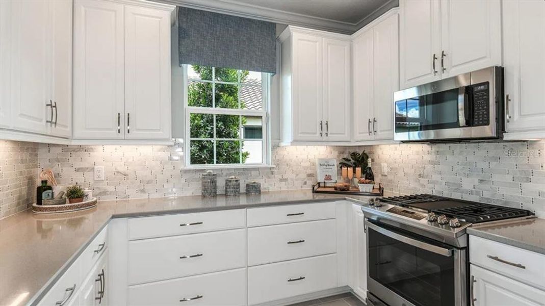 Furnished interior view inside a new home in Esplanade at Azario Lakewood Ranch, Bradenton (Image 14).