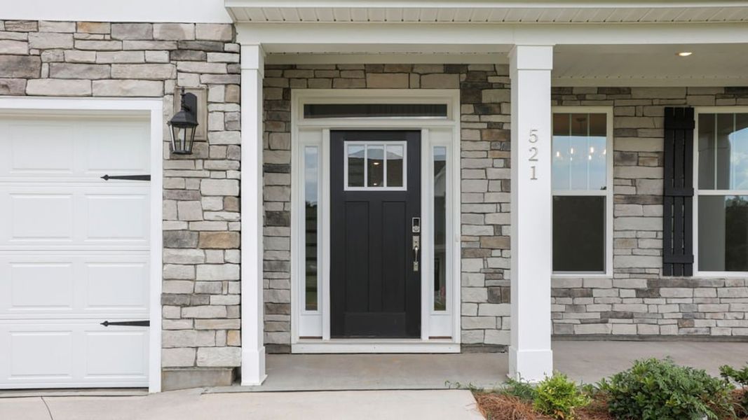 Exterior details and patio area of a home in Sycamore Cove, Woodruff (Image 3).
