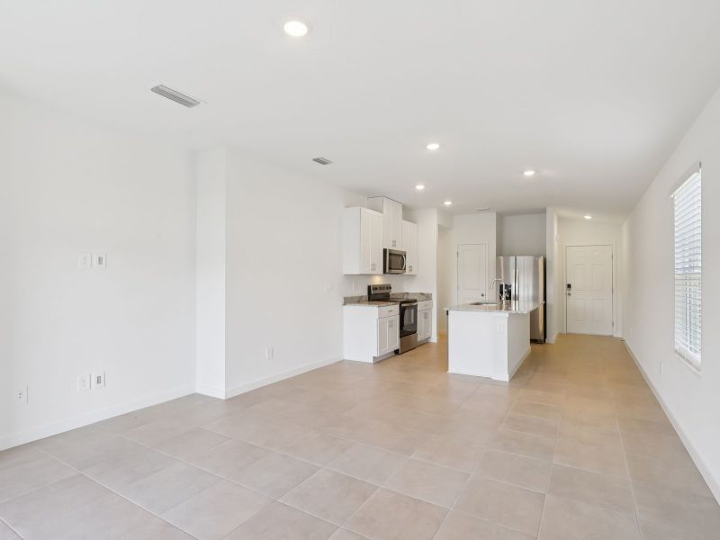 Spacious, unfurnished interior of a new home in Flagler Village - Classic Series, Palm Coast (Image 9). Spacious, unfurnished interior of a new home in Flagler Village - Classic Series, Palm Coast (Image 9).