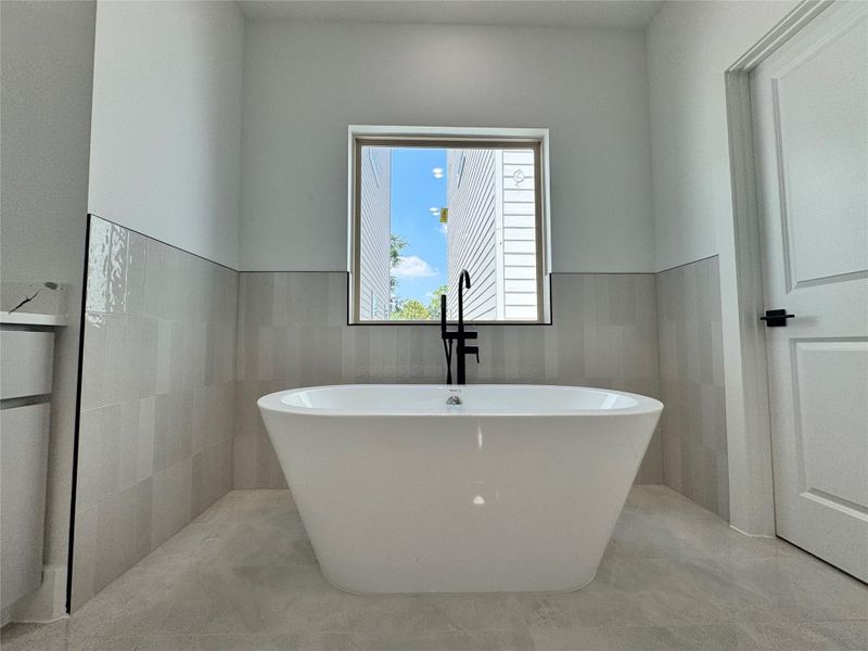 Primary bathroom soak in tub