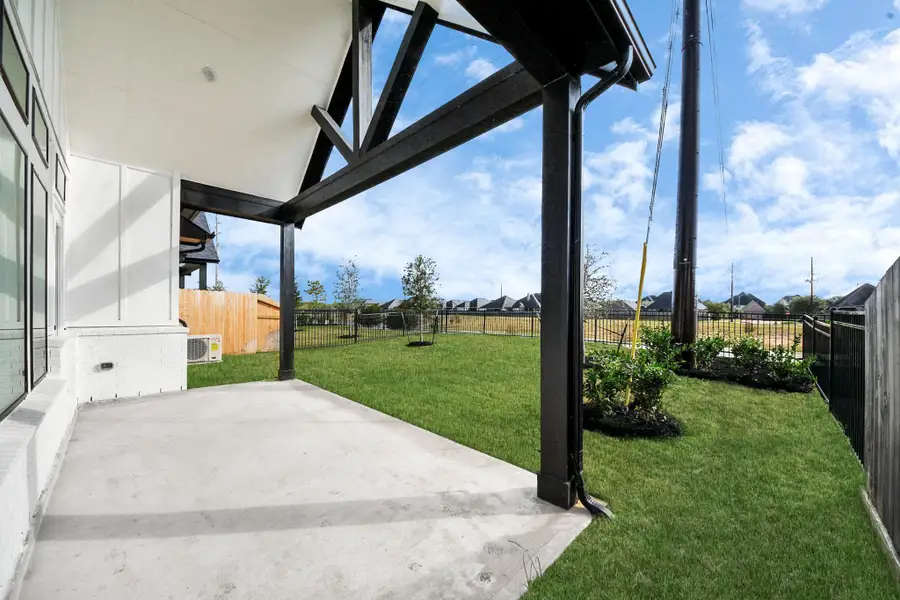 Exterior details and patio area of a home in Jordan Ranch: Signature Series, Katy (Image 2). Exterior details and patio area of a home in Jordan Ranch: Signature Series, Katy (Image 2).